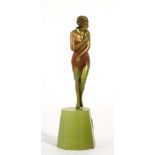 Josef Lorenzl (1892-1950), A cold-painted bronze figure, circa 1925, modelled as a woman, on a green