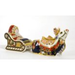 Royal Crown Derby Imari paperweights; Santa in his sleigh and Reindeer (2) (each with gold stopper)