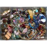 A quantity of costume jewellery, including beaded necklaces, bangles, rings, brooches