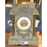 A Victorian green onyx striking mantle clock