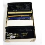 Four various Waterman's fountain pens, two with nibs stamped '14K'; together with a Waterman's