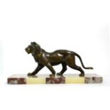 Irenee Rene Rochard (French, 1906-1984), An Art Deco patinated metal figure of a lion, on a marble