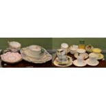 A group of Shelley cups; saucers; trios and vases etc (two trays)
