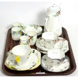 A Shelley part coffee service; coffee pot and four cups and saucers; and three further Shelley