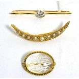 A split pearl and diamond crescent brooch, graduated split pearls with rose cut diamond accents,