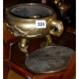 Chinese two-handled bronze censer on tripod legs, and a Japanese burnished steel hand mirror