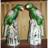 Pair of 20th c Chinese porcelain parrots