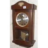 Oak cased wall clock