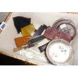 Box of assorted penknives, mother-of-pearl spoons and rings, coasters, a cut-throat razor etc