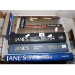 Box of Nautical related books including three volumes of Jane's Fighting Ships and Manuals of
