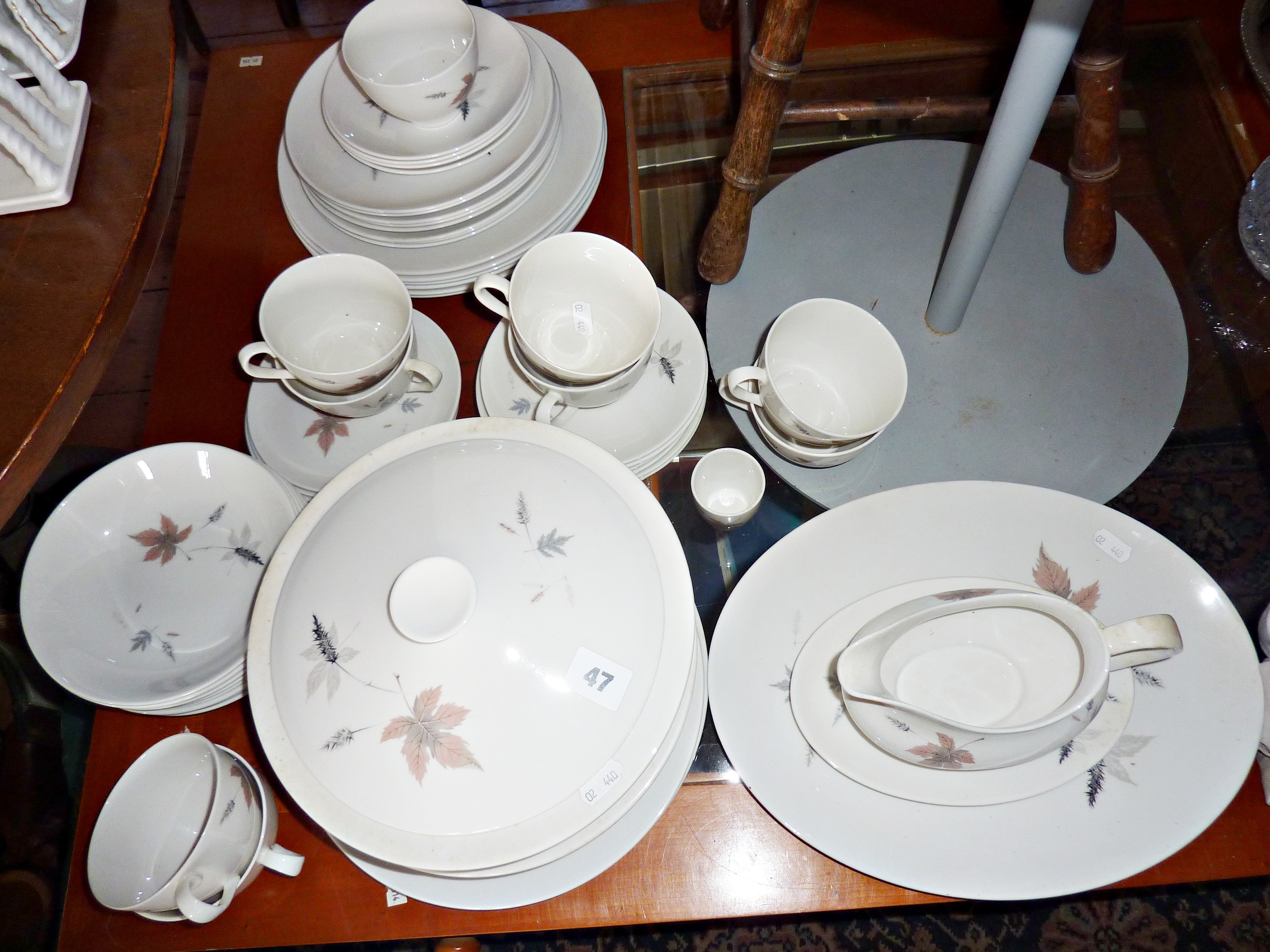 Royal Doulton Tumbling Leaves dinnerware including tureen, plates, cups & saucers, gravy boat on