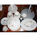 Royal Doulton Tumbling Leaves dinnerware including tureen, plates, cups & saucers, gravy boat on