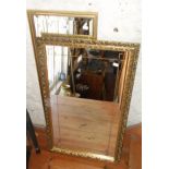 Two modern gilt-framed wall mirrors