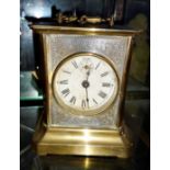 Junghans brass carriage alarm clock with musical alarm