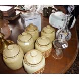 Set of six 1970s stoneware storage jars, a Stuart Crystal rose bowl (boxed), two decanters (one