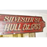 Long painted wooden sign of the Anchor Brewery in Hull