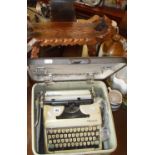 Olympian portable typewriter, and a carved wood stool with back