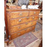 Georgian oak chest of drawers on ogee bracket feet having three dummy drawers and lift-up top