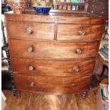 Early 19th c. mahogany bow-fronted chest of drawers with stringing inlay & brass knobs