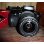 Canon EOS.750 camera with zoom lens