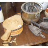 Wooden bellows, a brass pot, two flat irons with trivets etc