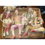 Four finely made bisque figures or art dolls with embroidered clothing (one A/F)