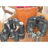 Five pairs of various binoculars