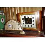 Art Deco chromed demi-lune mantle clock, and an Art Deco walnut-cased mantle clock by Glen of