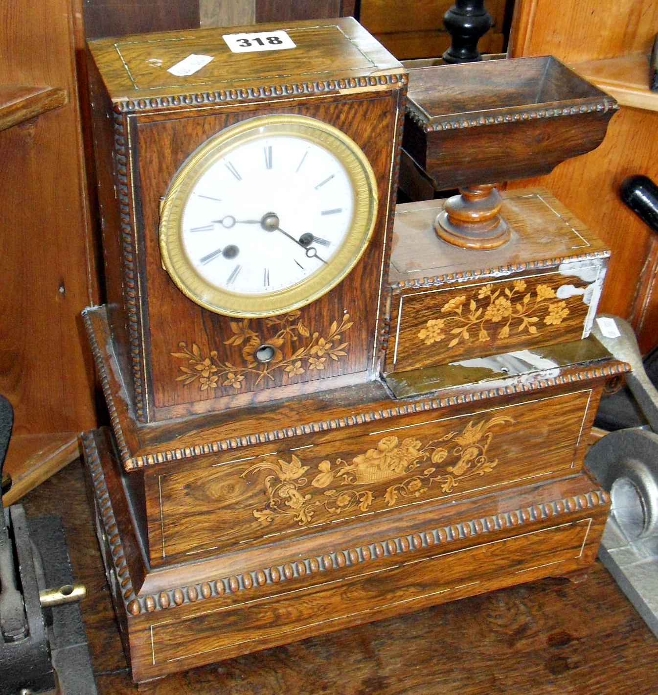 Unusual 19th c. French cigar lighter clock with marquetry panels & a match holder in urn on turned