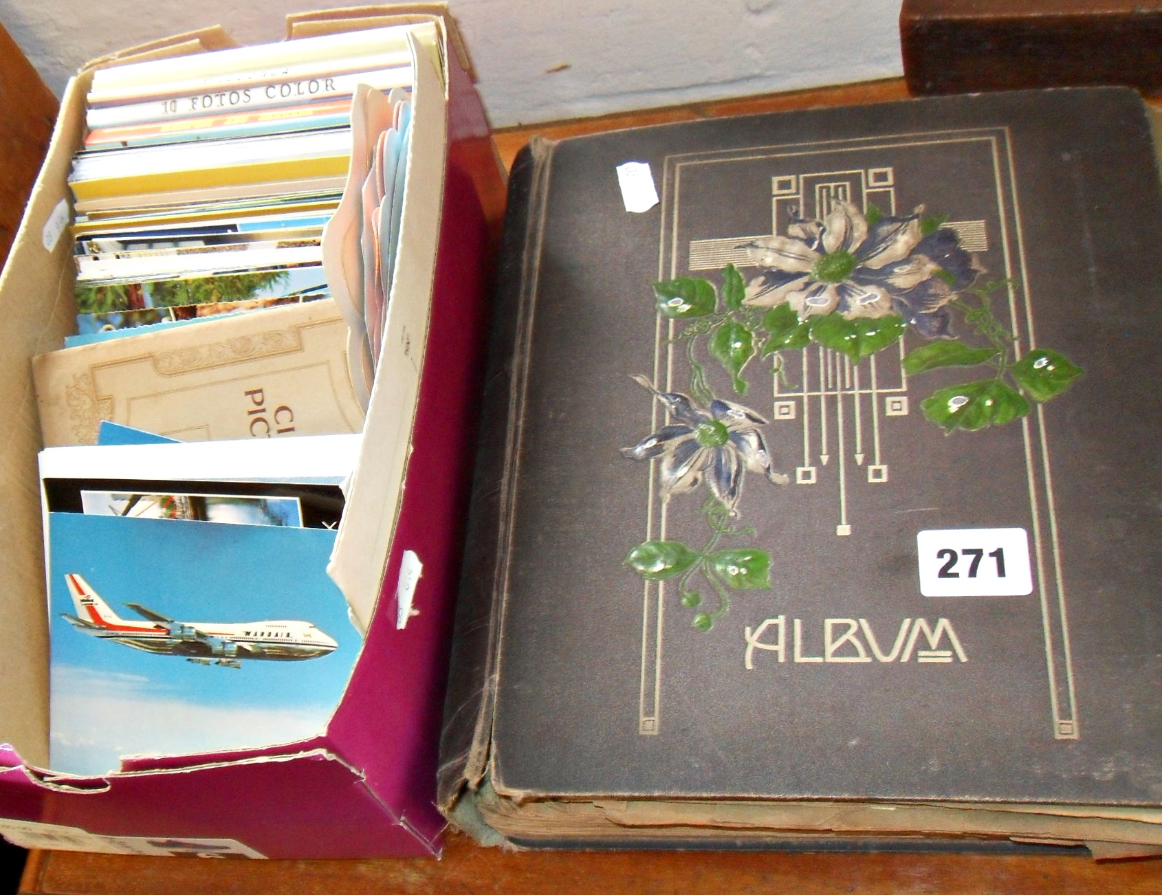 Postcard album with cards c.1913-24, and a shoebox of loose cards