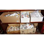 Large collection of old buttons stitched onto lacework fabric (five boxes)