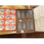 A cased set of early 20th c. Japanese ink blocks, and a cased set of miniature Oriental teabowls