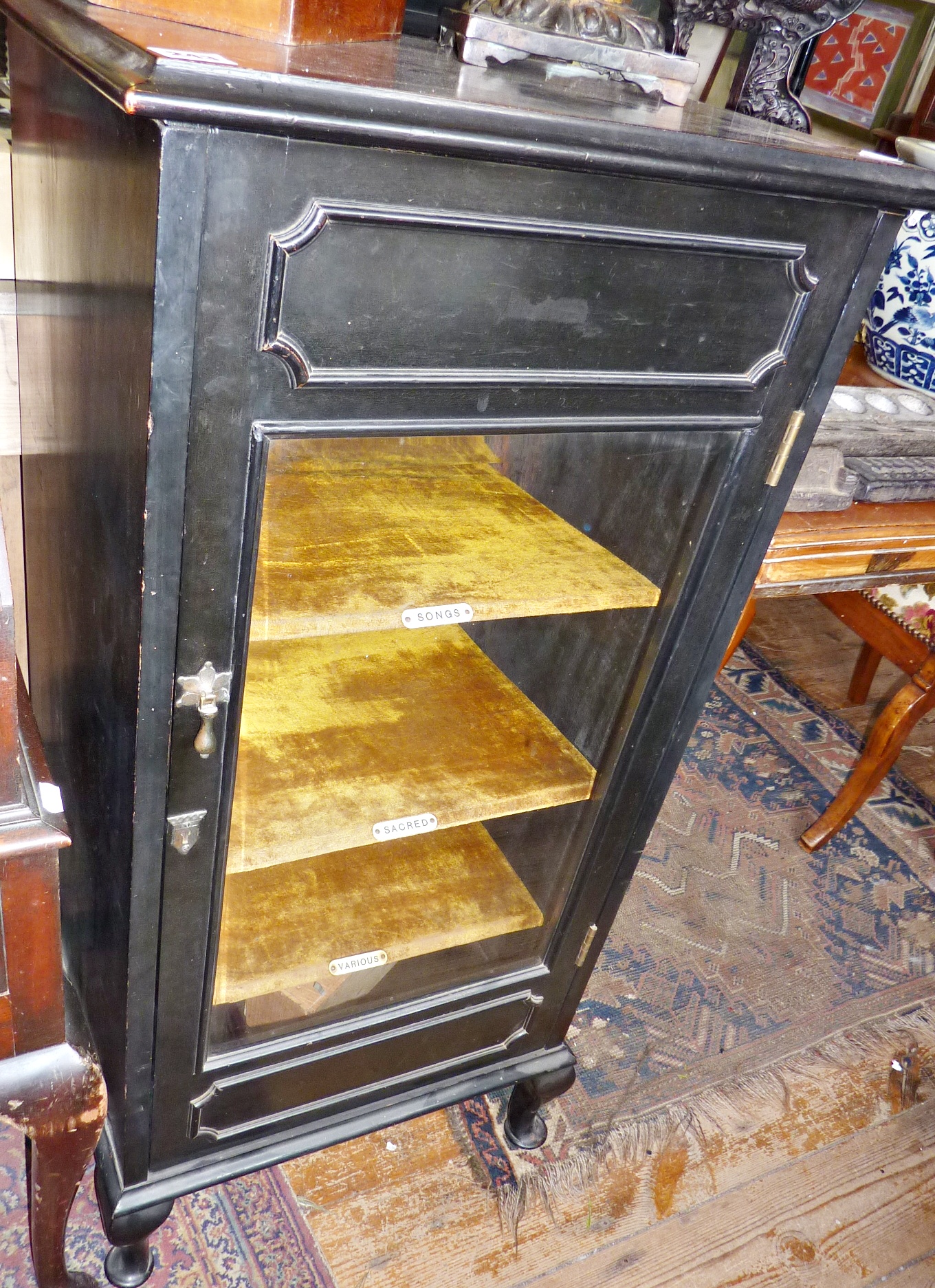 Victorian ebonised music cabinet with lift-up top revealing music stand & having velvet-lined