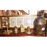 Early large metal cowbell,and other brass bells including one Oriental and a dinner bell on stand