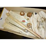Box of assorted carved bone ladies fans for restoration, enamelled opium bottle, silver-handled
