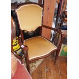 Edwardian Art Nouveau mahogany elbow chair with upholstered seat & back