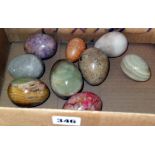 Nine various marble eggs