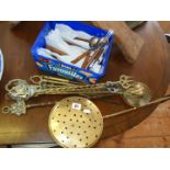 Assorted brassware - toasting forks etc with box of teak-handled cutlery