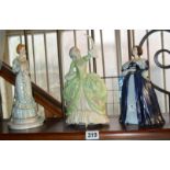 Three porcelain lady figurines