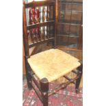 Set of eight 19th c spindle-back rush seat dining chairs, including one carver