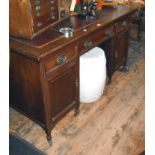 Late 19th c. mahogany kneehole desk with tooled leather top above three drawers & cupboard doors, on