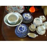 Assorted willow pattern plates & tureen, a china tea service and a chamberpot with washbowl
