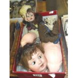 Two German porcelain-headed dolls (A/F)