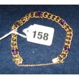 9ct gold chain bracelet set with amethysts (approx 14gms)