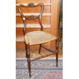 Regency rosewood bedroom chair with original canework seat