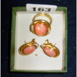 A 14ct gold (.585) ladies dress ring & earring set. The ring having peach jade stone flanked by