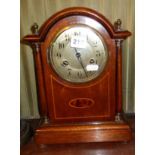 Edwardian inlaid mahogany 8-day mantle clock, arch-topped & turned pillars with brass finials