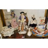 Shelf of assorted china including figurines, Imari plate etc