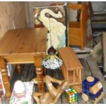 Assorted wooden items, a pine stool, a mahogany rack, and a carved painted wood 'elephant'