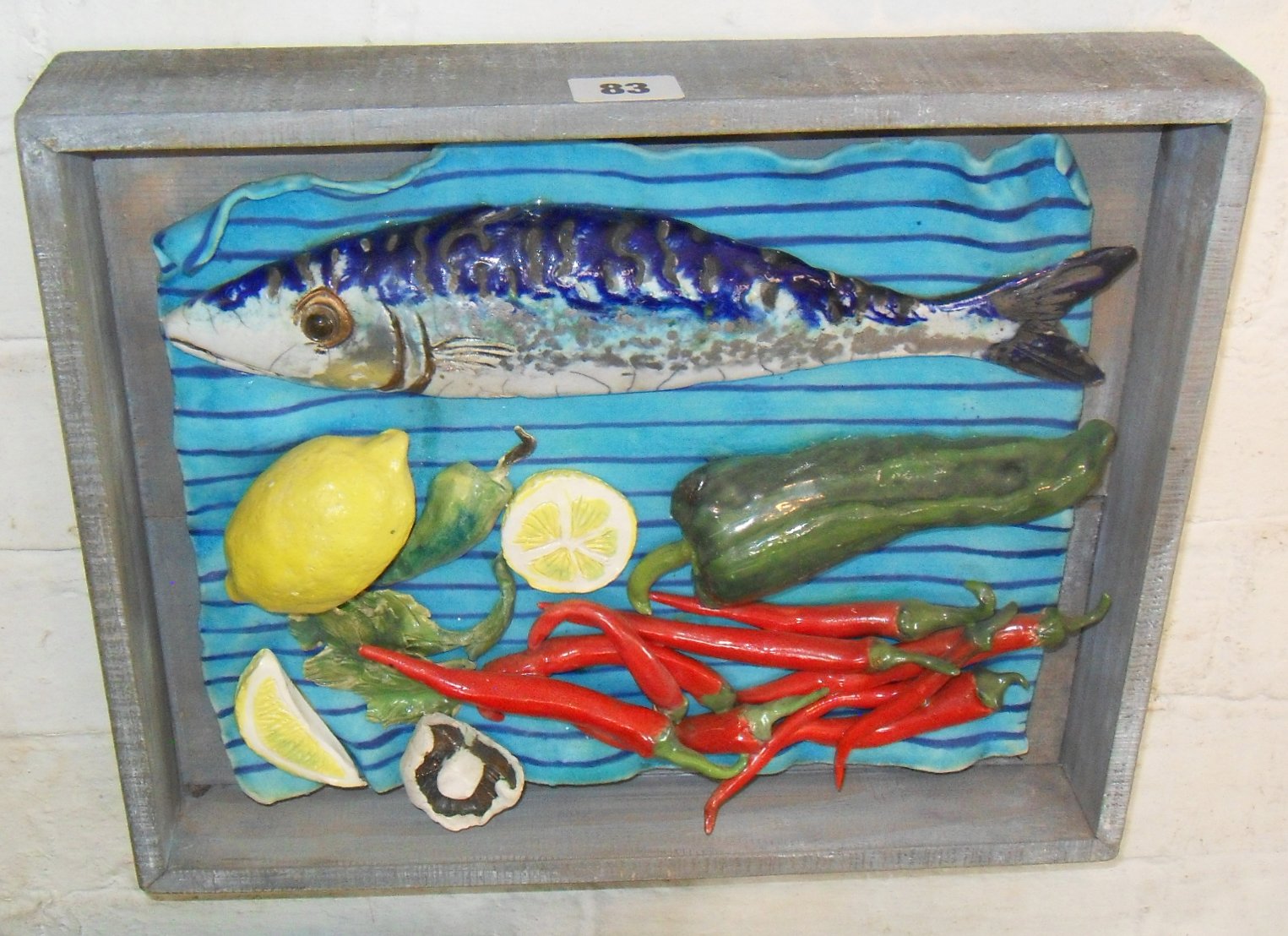 Contemporary painted ceramic 3D still life with fish & vegetables, by Diana Tenison